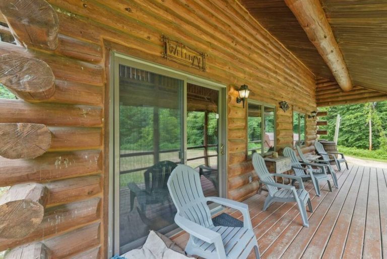 Take in the quiet surroundings of nature from the front porch.