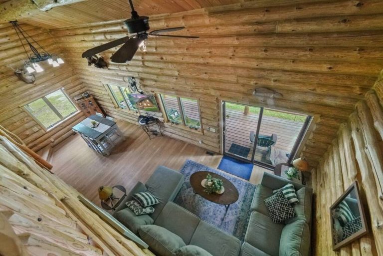Absolute seclusion in this beautiful log cabin with cathedral ceilings.